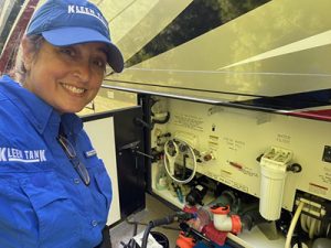 Wendy Bruce, Kleen Tank of Michigan, performing an RV tank cleaning service